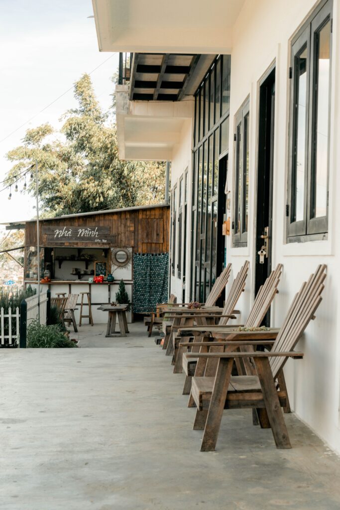 Charming rustic outdoor seating at a cafe in Đà Lạt, Vietnam. Perfect for a peaceful morning coffee.